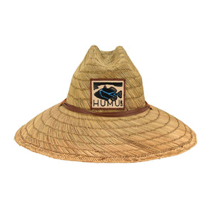 A natural straw wide-brim sun hat with a brown leather band and embroidered Humu Surf fish patch logo and the text 'HUMU SURF'.