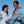 Load image into Gallery viewer, Man and woman wearing Humu Woody Bamboo Lightweight Hoodies in marine blue and light blue beside the ocean
