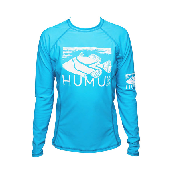 Front view of the Humu Women's Wahine Kore-Dry Long Sleeve Rashguard in Hawaii Blue with white Humu Surf fish graphics on the chest and sleeve