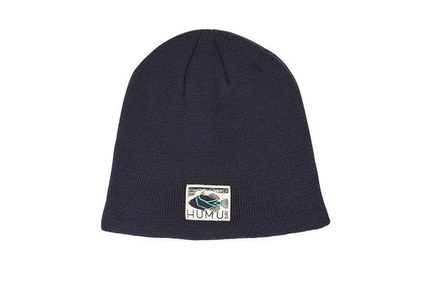 Front view of the surf slate colored Humu Surf Beanie with embroidered Humu fish logo patch